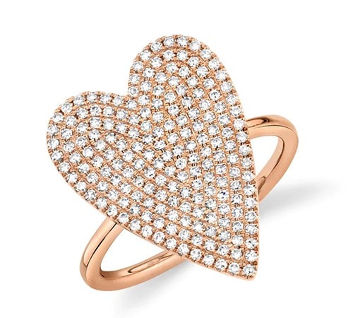 Rose gold fashion ring exhibiting a large heart design showcasing diamonds