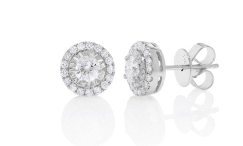 Diamond stud earrings featuring a halo setting