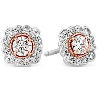 Stud earrings with diamonds, rose gold, and a floral silhouette