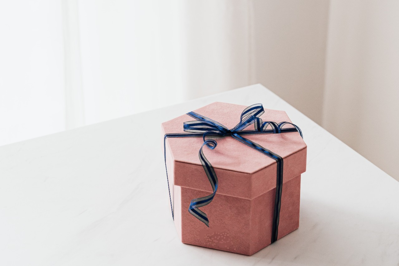 Carefully tied pink box, probably full of luxury jewelry