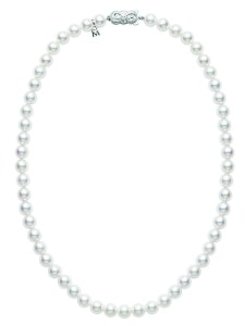 A pearl necklace from Mikimoto features a white gold clasp