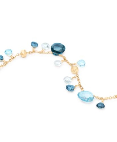 Blue topaz and yellow gold bracelet