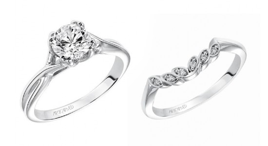 a solitaire engagement ring next to a curved wedding band